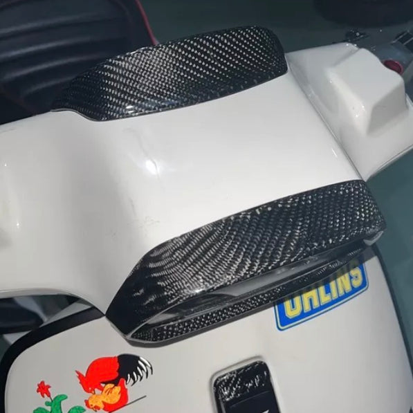 Vespa Sprint & Primavera Koplamp Rand Geweven Carbon